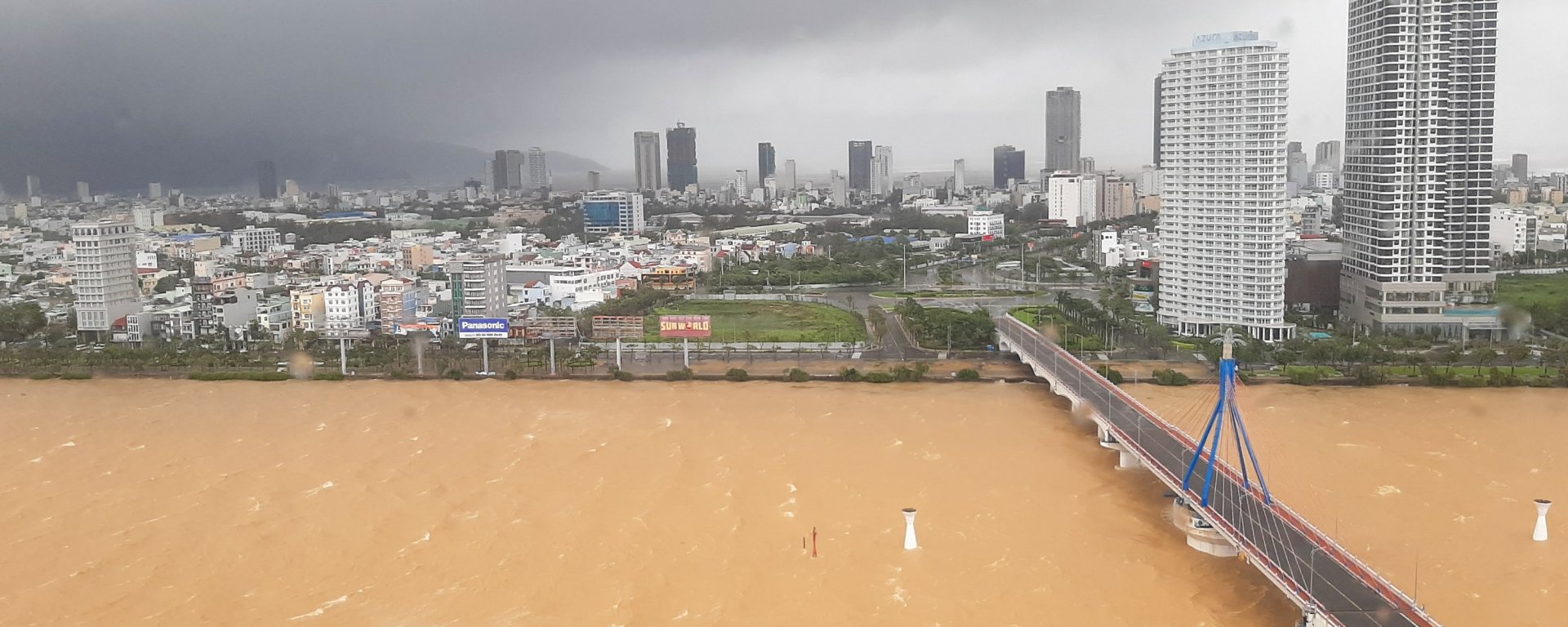 Waves and ripples in the Han River as Typhoon Molave looms over Danang City